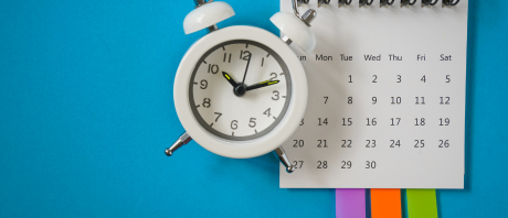 An alarm clock and a calendar