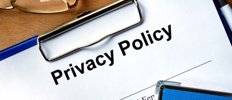 A page in a clipboard that reads "Privacy Policy"