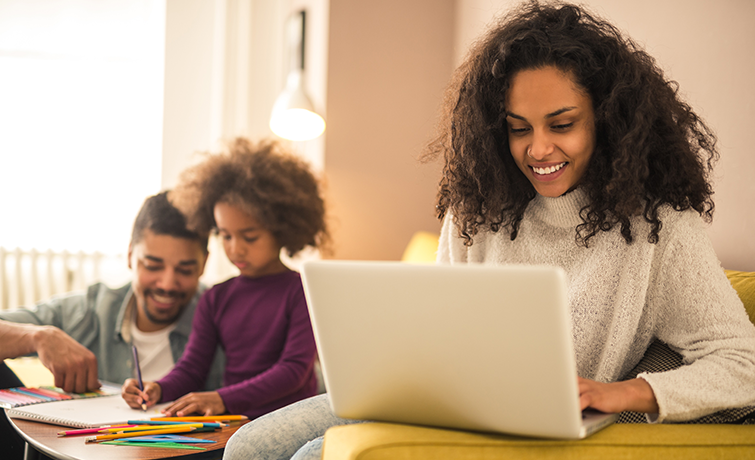 Mom and child looking at computer